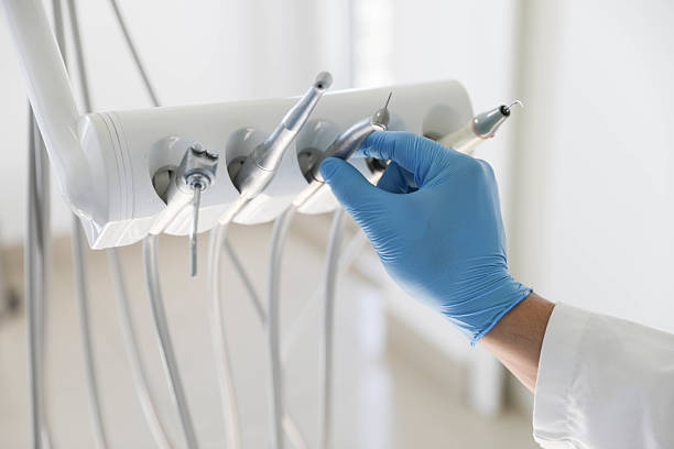 Professional Tooth Extraction technician working in Sherwood, OR